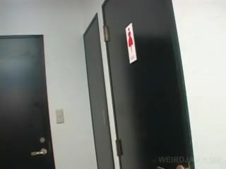 Asian Teen enchantress movs Twat While Pissing In A Toilet