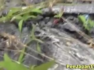 Japanes girl Peeing Outside